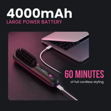 Cordless hair straightening brush shown on a flat surface
